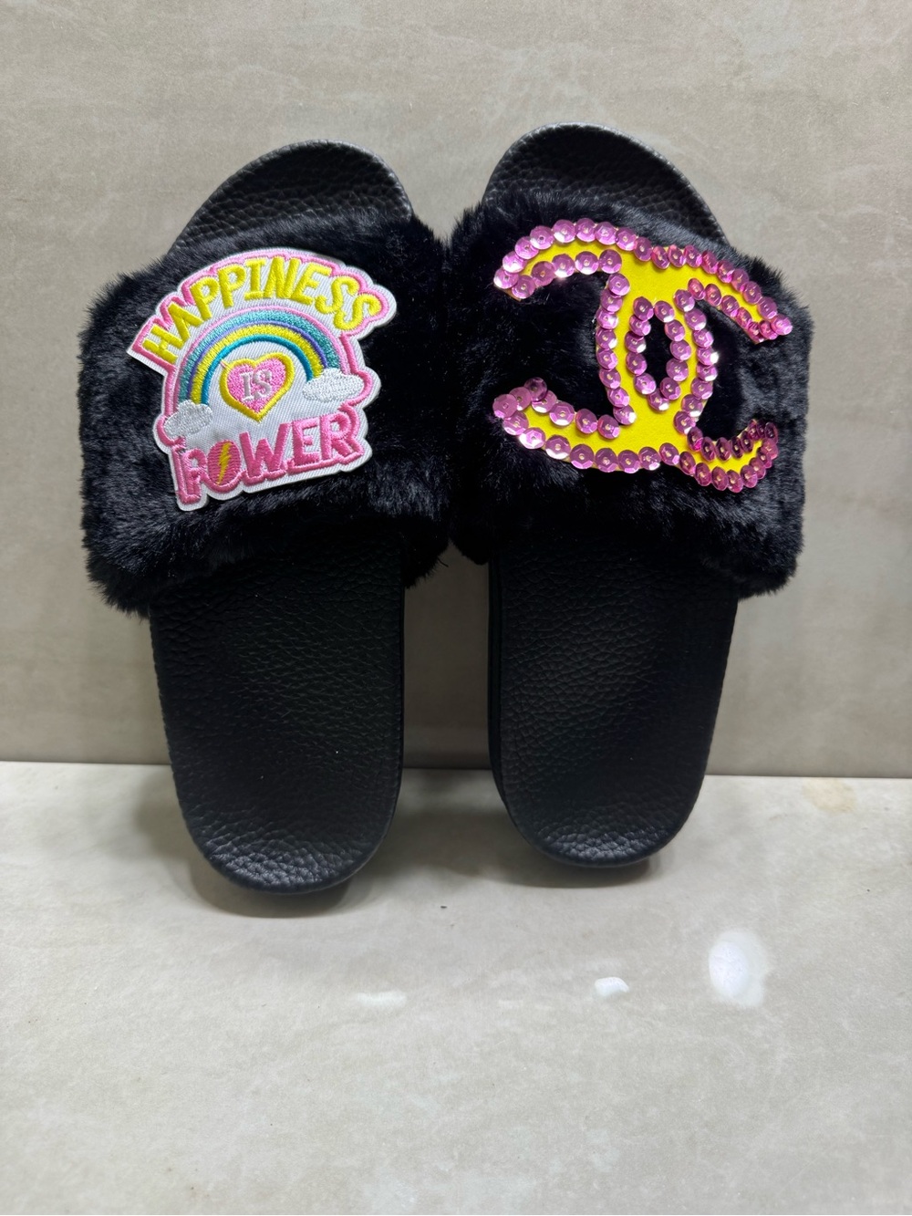 Black Fuzzy Slide Sandals with Pink & Yellow Embellishments